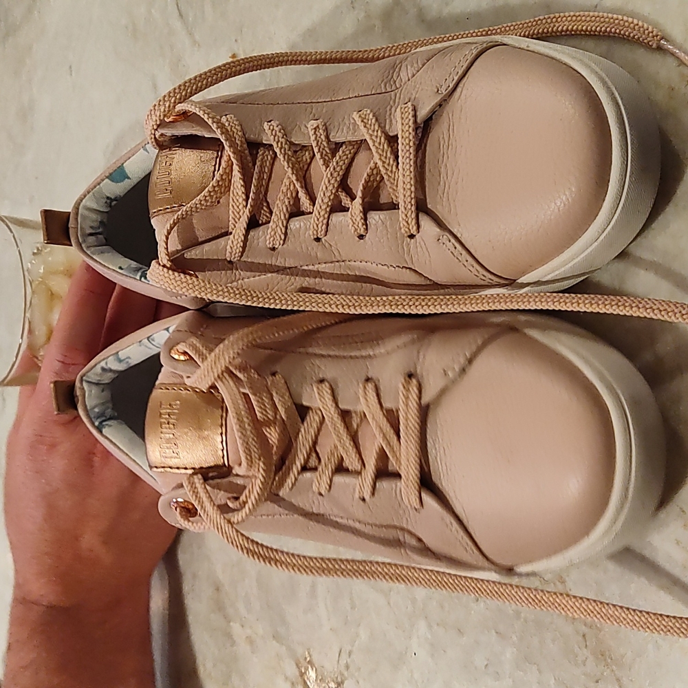 Pale pink cougar sneakers